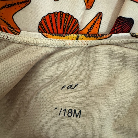 Kortni Jeane 12-18 months seashell one piece mini skirted bathing suit - Picture 3 of 3